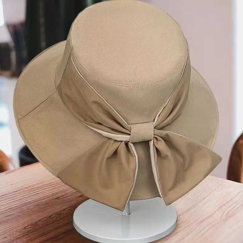 New Summer Womens Bow Fashion Wide Brown Sun Hat Outdoor Beach Fishermans Hat UV Protective Sun Hat Bucket Hat Gift W250217