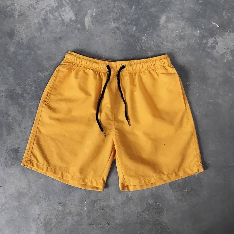Ice Silk mens beach shorts Light breathable Summer sports Candy color Surf Swimming loose large size 250118