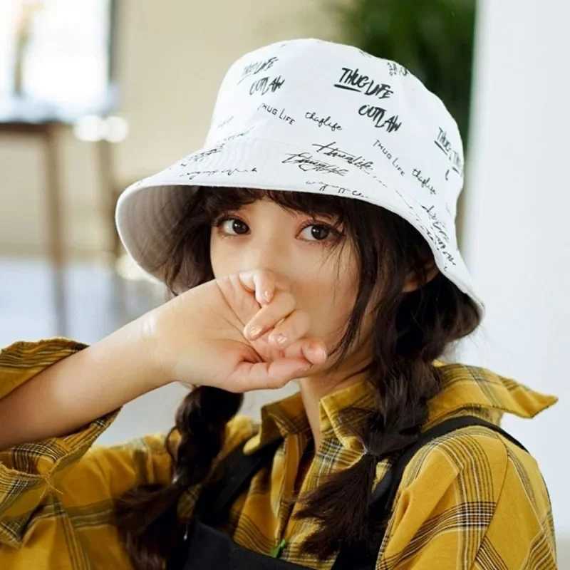 Double sided womens bucket hat Japanese graffiti letter outdoor sun hat unisex wide brown folding fisherman glasses W250217