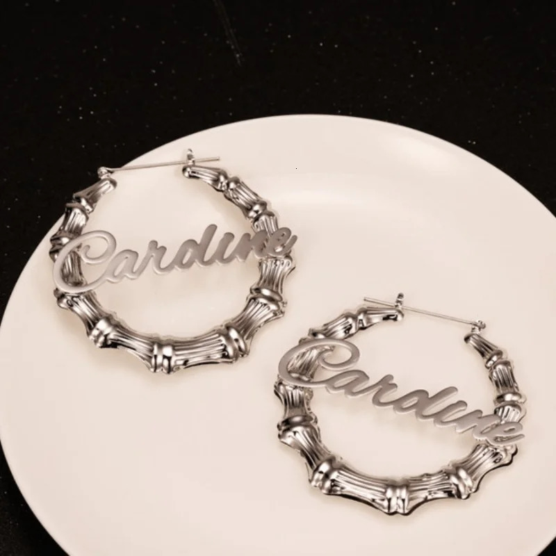 A unique 3-in-1 personalized name bamboo earring and necklace set customized with Halloween decoration inspiration 250214