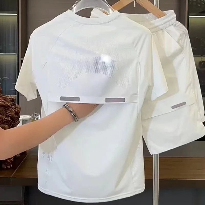 2024 Summer Mens Breathable Perforated Ice Silk Short Sleeve Shorts Set Loose Quick Drying Sports and Leisure Two Piece Set 250217