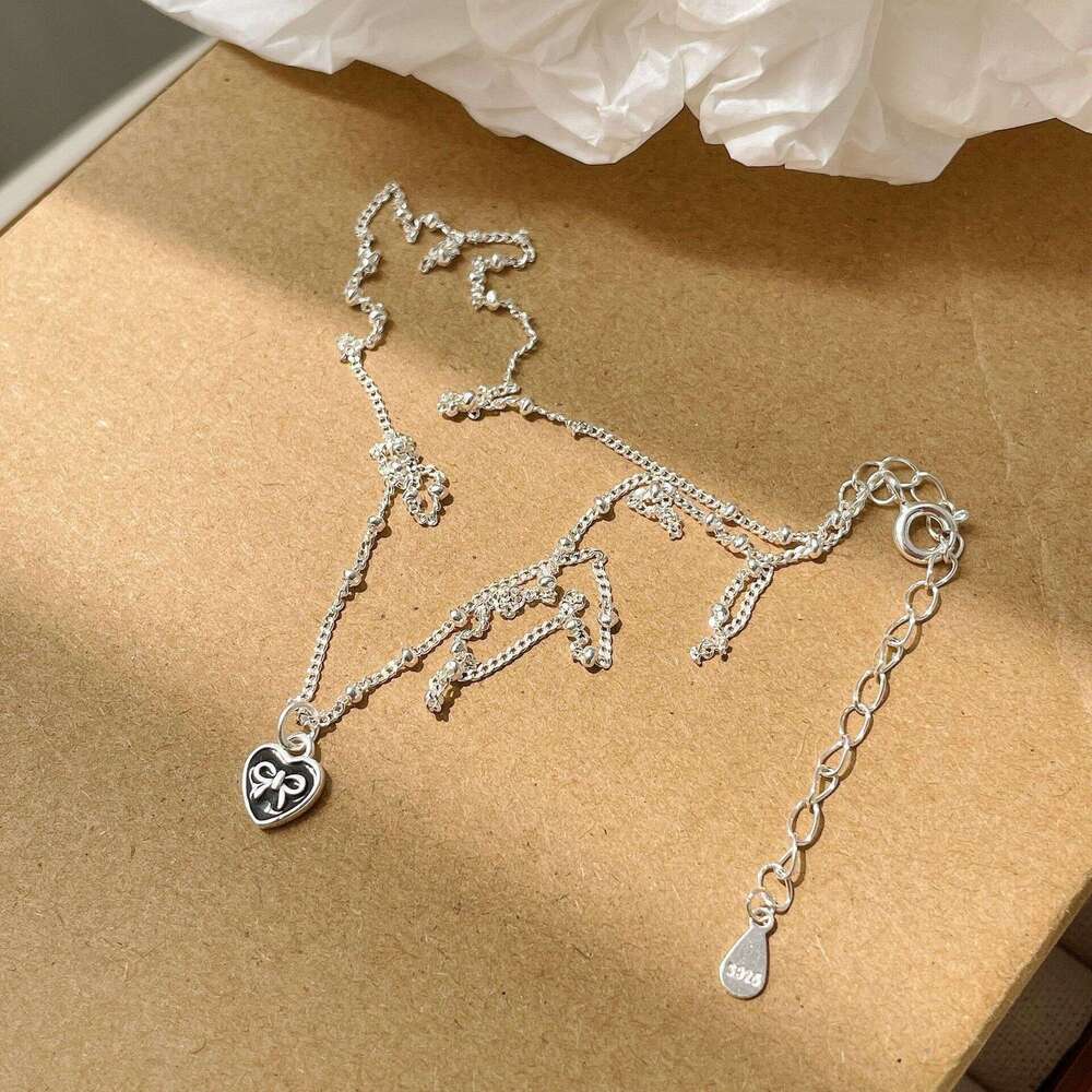 Tiqi Korean version S sier jewelry simple, creative and fashionable heart-shaped collarbone chain mini bow love necklace for women