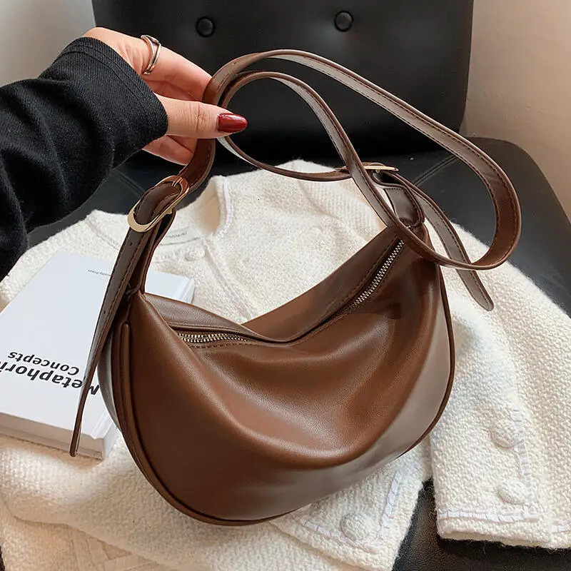 Fashion adhesive bag womens shoulder bag texture solid color niche soft leather Korean casual edition outdoor cross body bag 250214