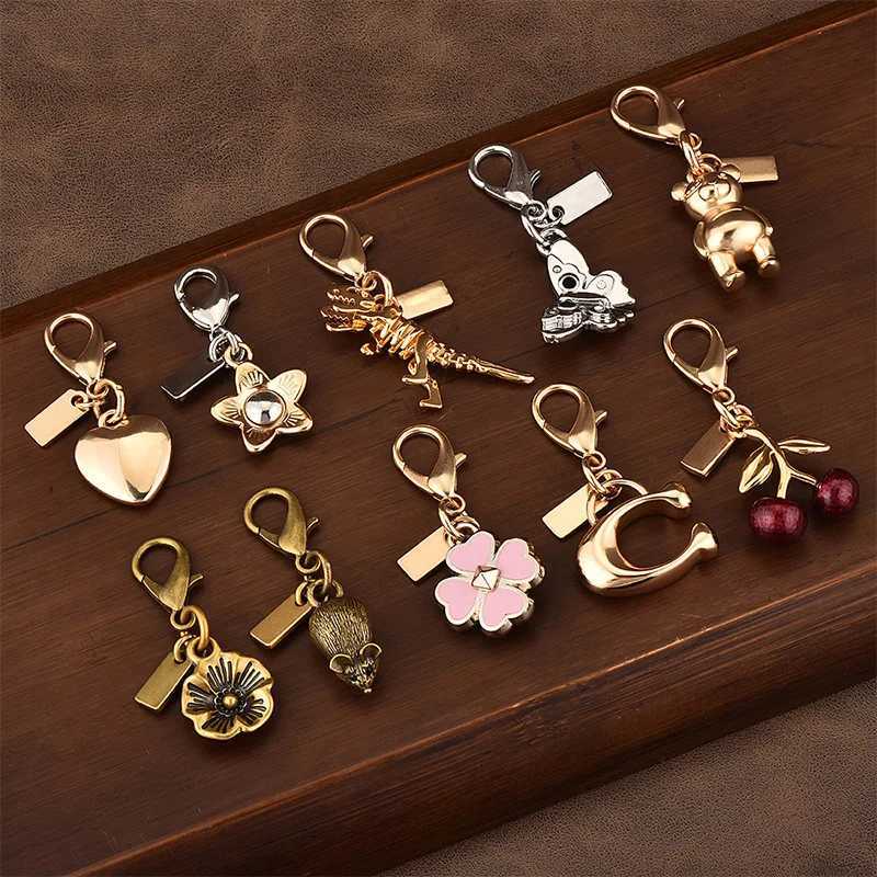 Keychains Lanyards Plush Wall Stuff New Fashionable Car Key Pendant Premium Bag Accessories Gold Bear Cherry Clover Butterfly Backpack Girl Gift H2502