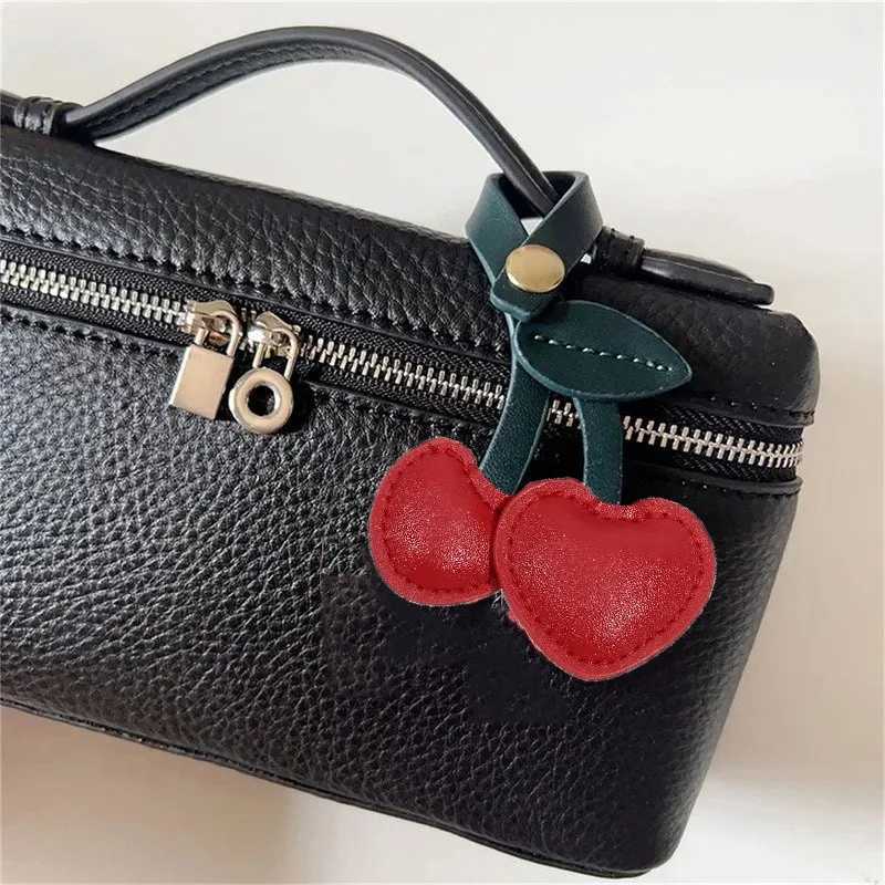 Keychains Lanyards Related product list Cute peach heart cherry fruit car keychain red pink love Versatile bag pendant H250217