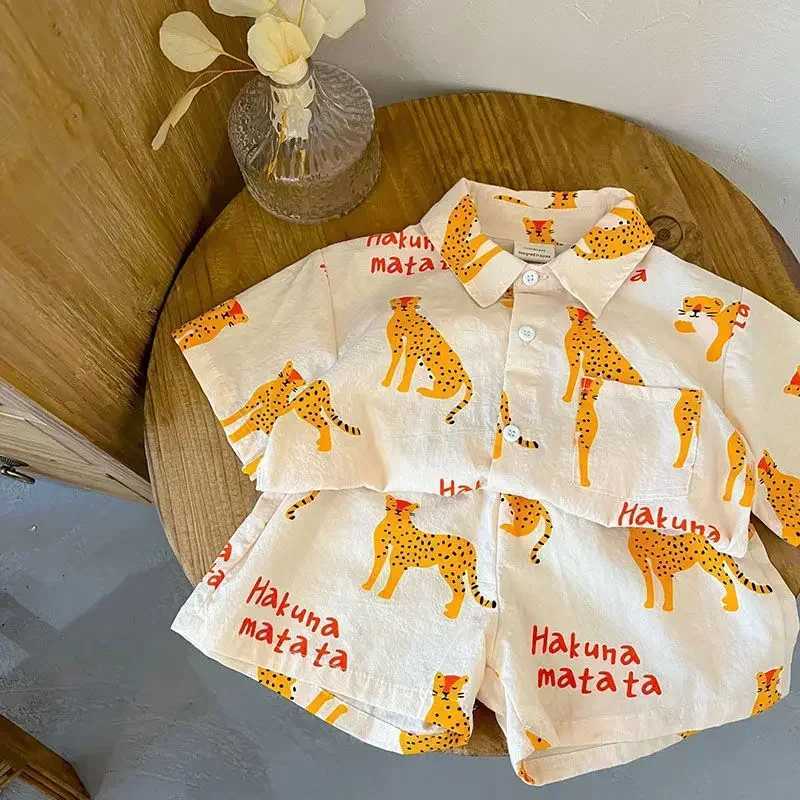 New childrens clothing boy set summer short sleeved shirt shorts 2-piece set fashionable boy cheetah print set childrens clothing W250218