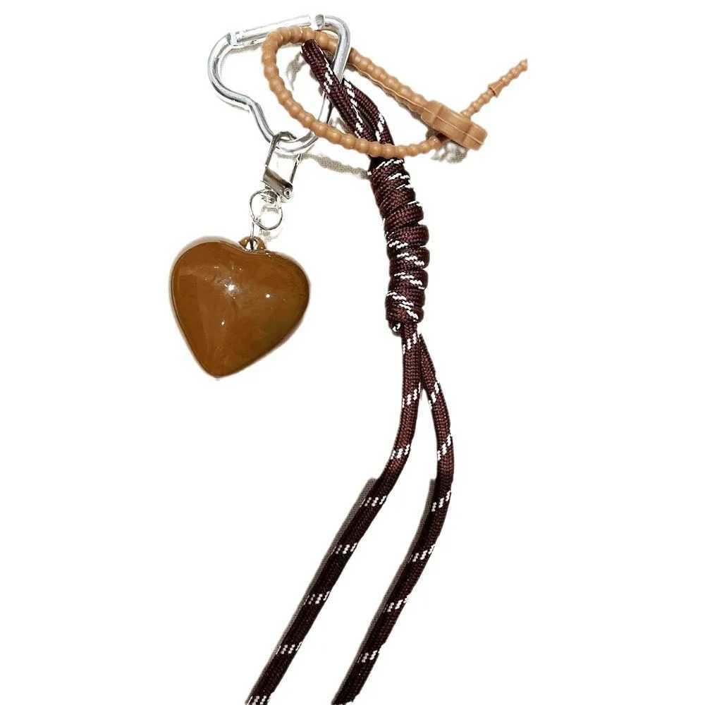 Keychains Lanyards 2024 New Style Angola Red Heart Braided Rope Keychain Pendant Personalized Bag Accessories H250217