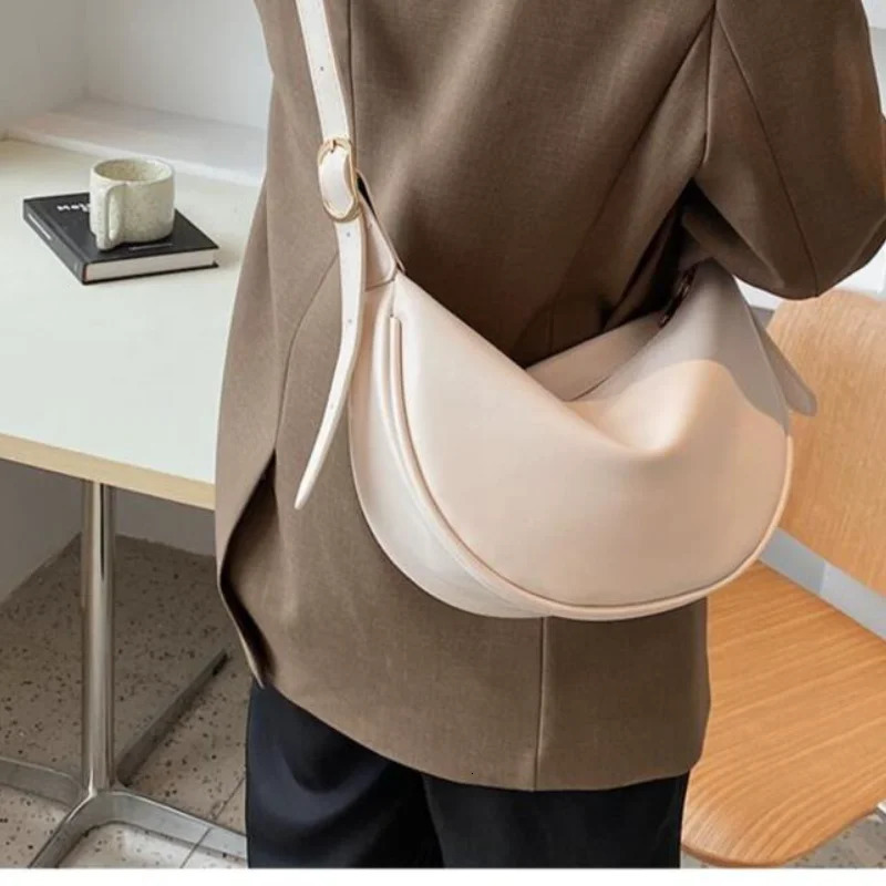 Fashion adhesive bag womens shoulder bag texture solid color niche soft leather Korean casual edition outdoor cross body bag 250214