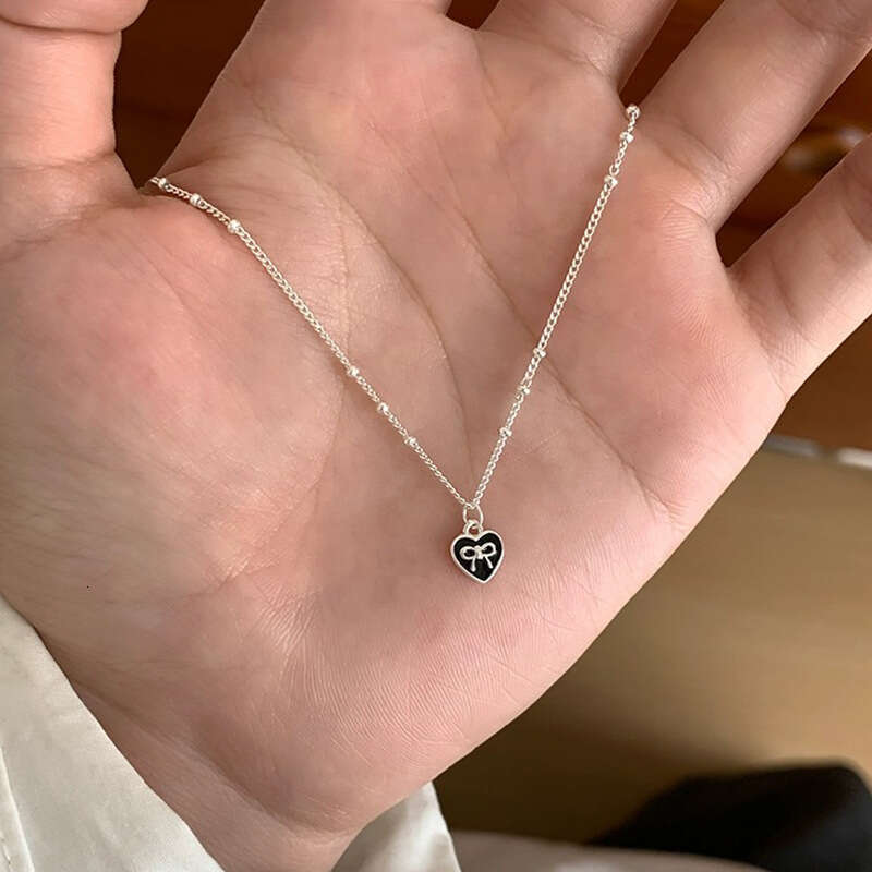 Tiqi Korean version S sier jewelry simple, creative and fashionable heart-shaped collarbone chain mini bow love necklace for women
