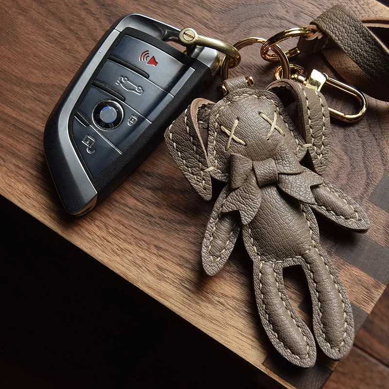 Keychains Lanyards Handmade Genuine Leather Cute Puppy Bag Keychain Pendant Car Key Ring For Women Men Charm DIY Accessories Couple Lover Gift H250217