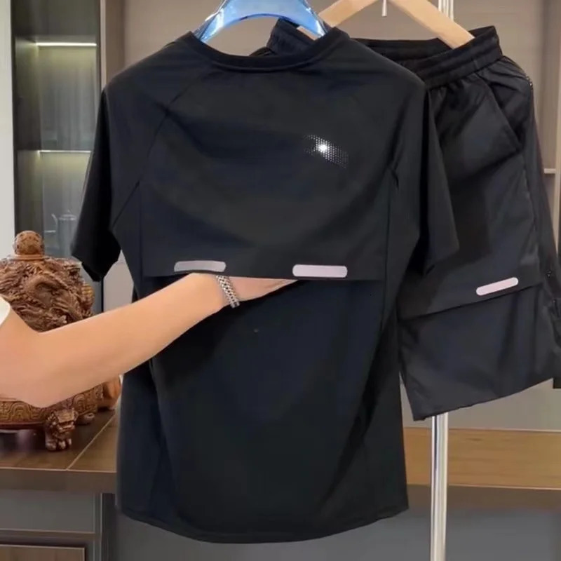 2024 Summer Mens Breathable Perforated Ice Silk Short Sleeve Shorts Set Loose Quick Drying Sports and Leisure Two Piece Set 250217