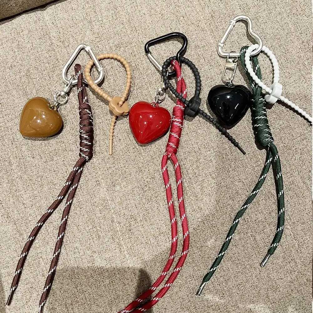 Keychains Lanyards 2024 New Style Angola Red Heart Braided Rope Keychain Pendant Personalized Bag Accessories H250217