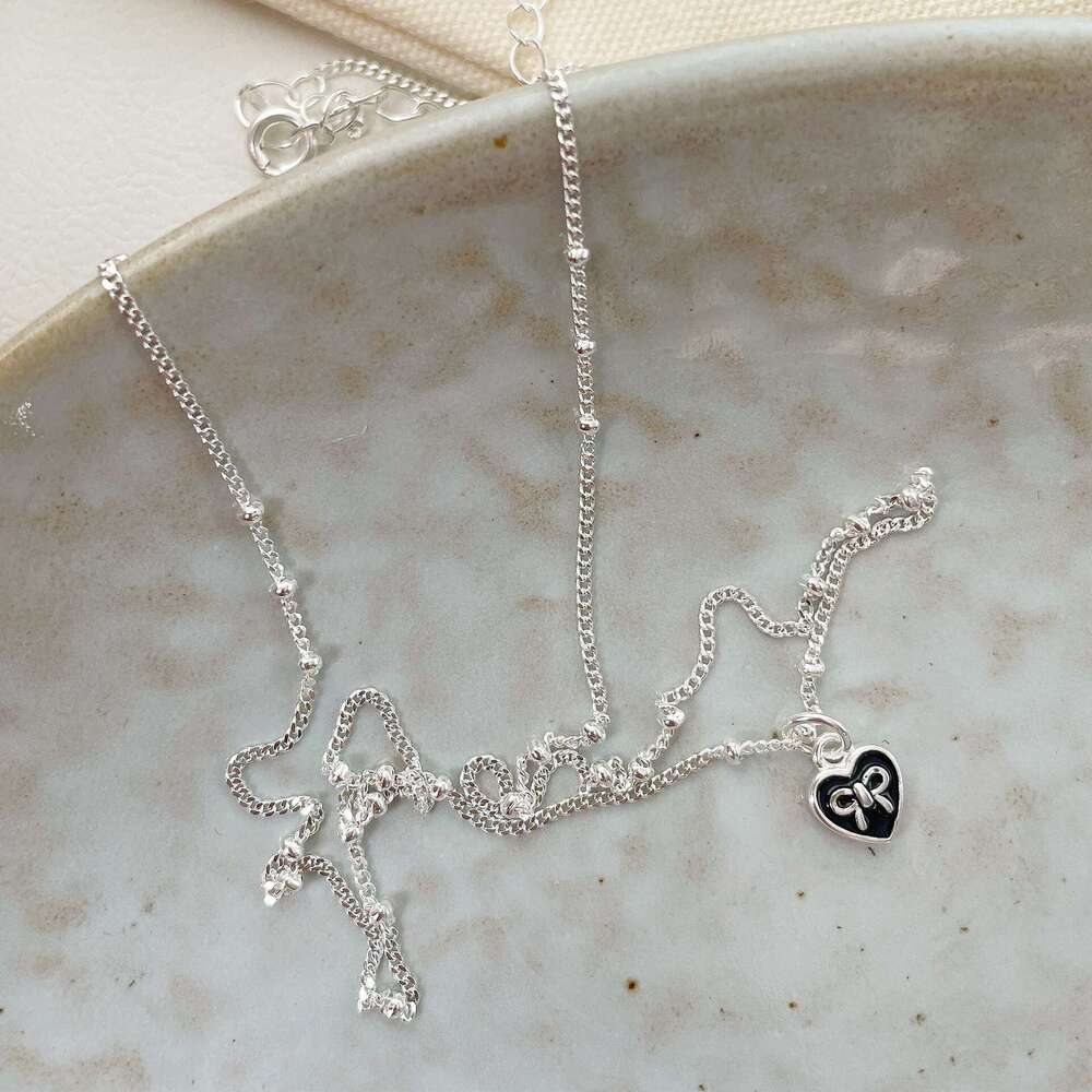 Tiqi Korean version S sier jewelry simple, creative and fashionable heart-shaped collarbone chain mini bow love necklace for women