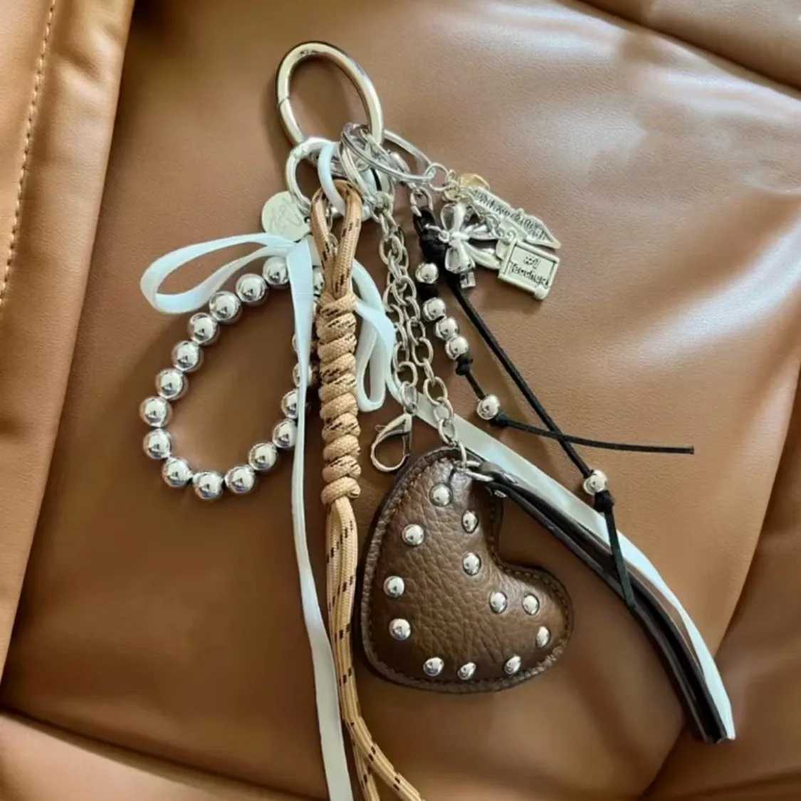 Keychains Lanyards 2025 New Brown Style Movie Cute Heart Extremely Complex Bag Pendant Weaving Rope Ornament Accessories Gift H250217