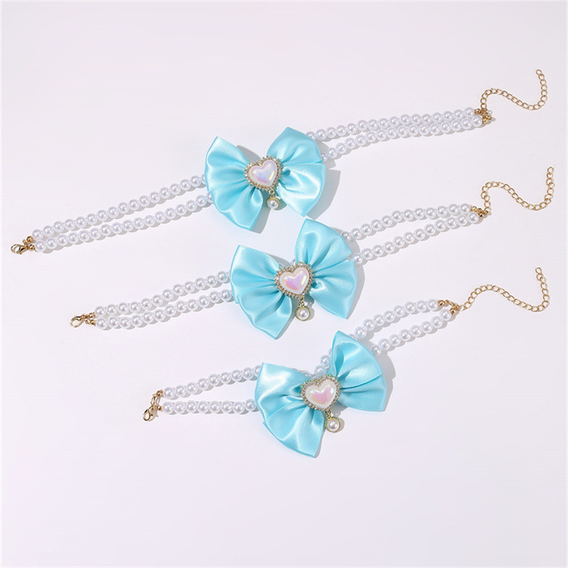 Chic Red Pearl Collar for Dogs and Cats - Double Layered Necklace with Rhinestone Bow Charms