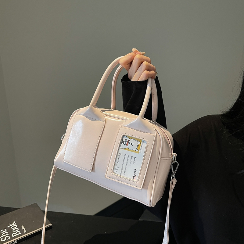 Bright Korean solid color hand-held Boston 2025 early spring new item, niche and interesting design, single shoulder crossbody bag #swissmilitary