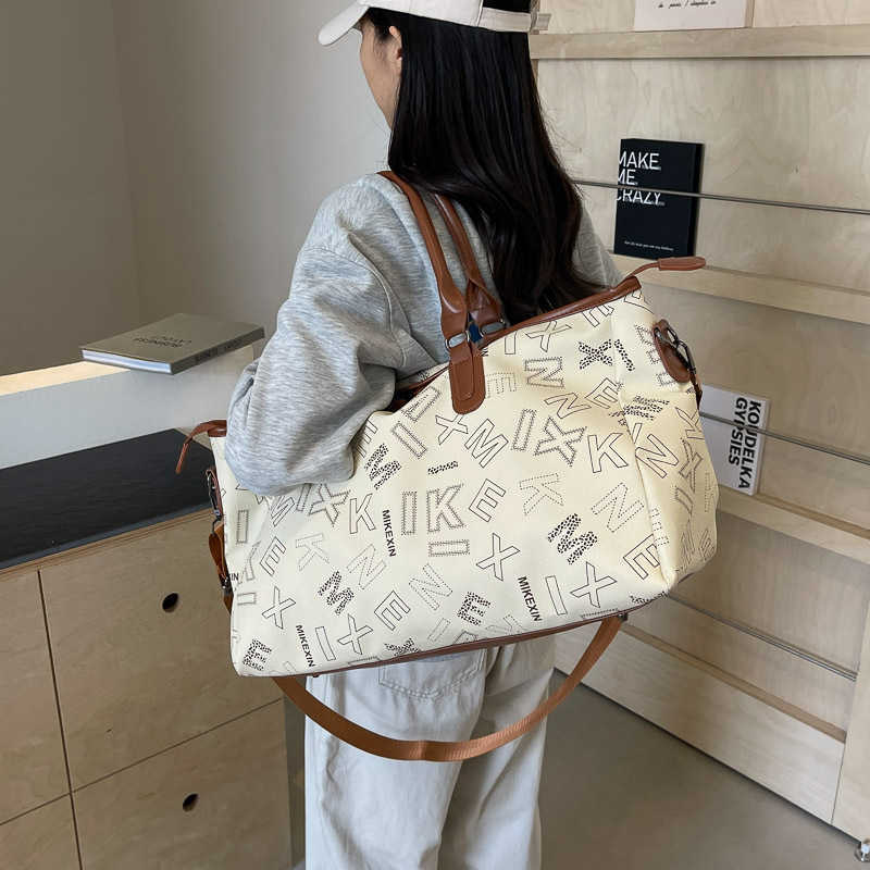 Large capacity tote bag for women, new niche high-end handbag, practical, fashionable, versatile single shoulder crossbody bag 250115