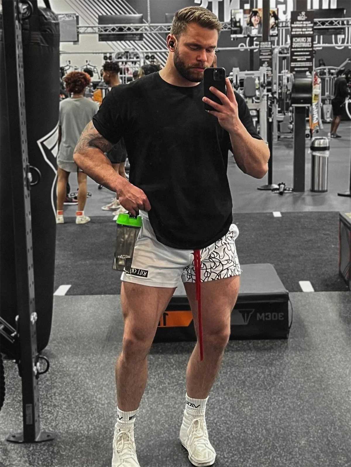 New fast drying running shorts for mens summer gym fitness breathable mesh Bermuda boxing training mens beach pants W250219