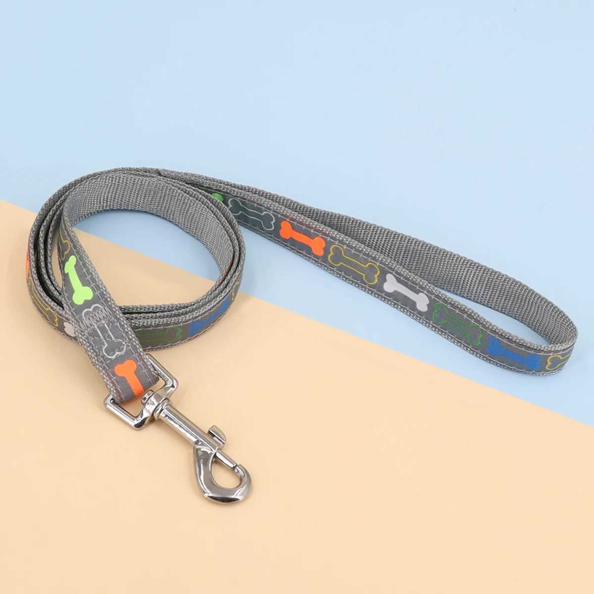 A cartoon bone dog leash for outdoor useXJ250218