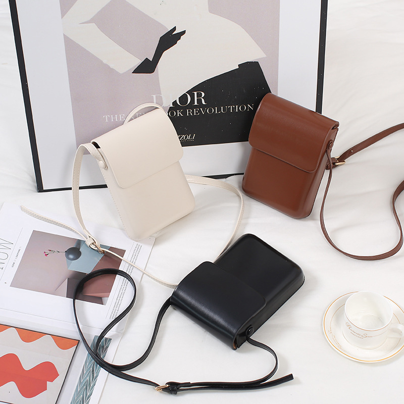 Korean version solid color pressed shell phone 2025 fashionable and versatile vertical small square simple commuting single shoulder diagonal swissmil