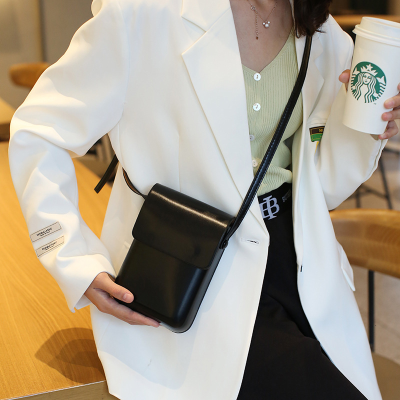 Korean version solid color pressed shell phone 2025 fashionable and versatile vertical small square simple commuting single shoulder diagonal swissmil