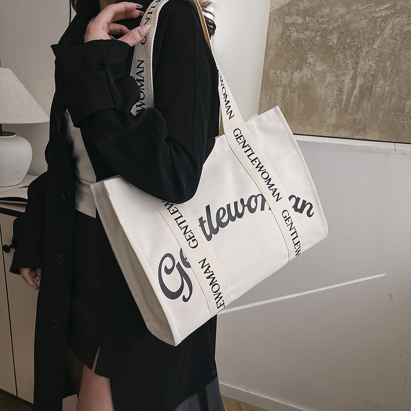 Thai niche Gentle Woman canvas women's 2025 letter printed tote bag, large capacity shoulder bag #swissmilitary