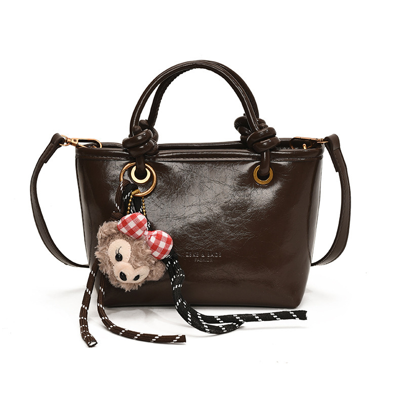 Melad oil wax leather bucket 2025 super hot handbag, shoulder crossbody bag, versatile #swissmilitary