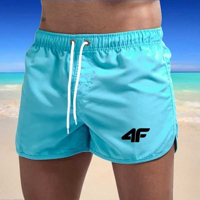 New mens fitness beach summer gym sportswear mens breathable sportswear loose casual jogging shorts W250219
