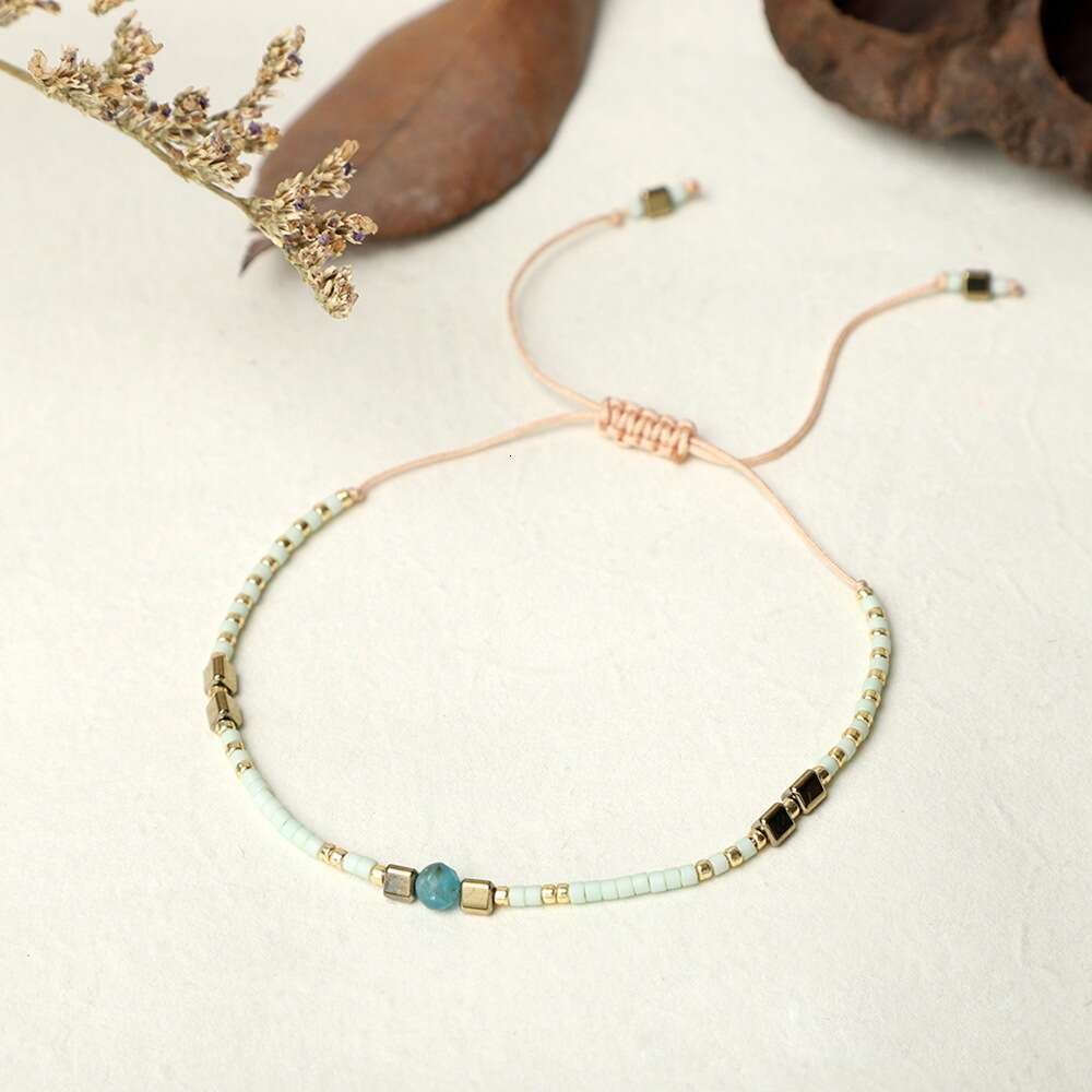Bohemian style minimalist rice bead hand woven friendship rope iron gallbladder half women's jewelry small bracelet
