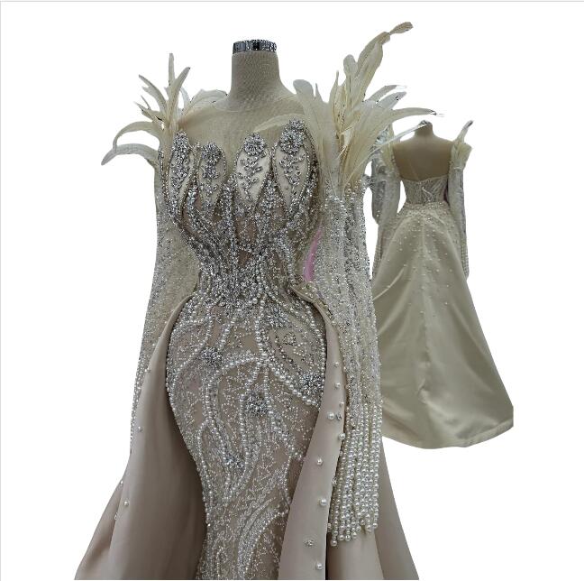 Champagne Long Sleeve Feathers Arabic Dubai Evening Dress 2025 Customized Crystals Pearl Prom Dress Engagement Gowns With Train