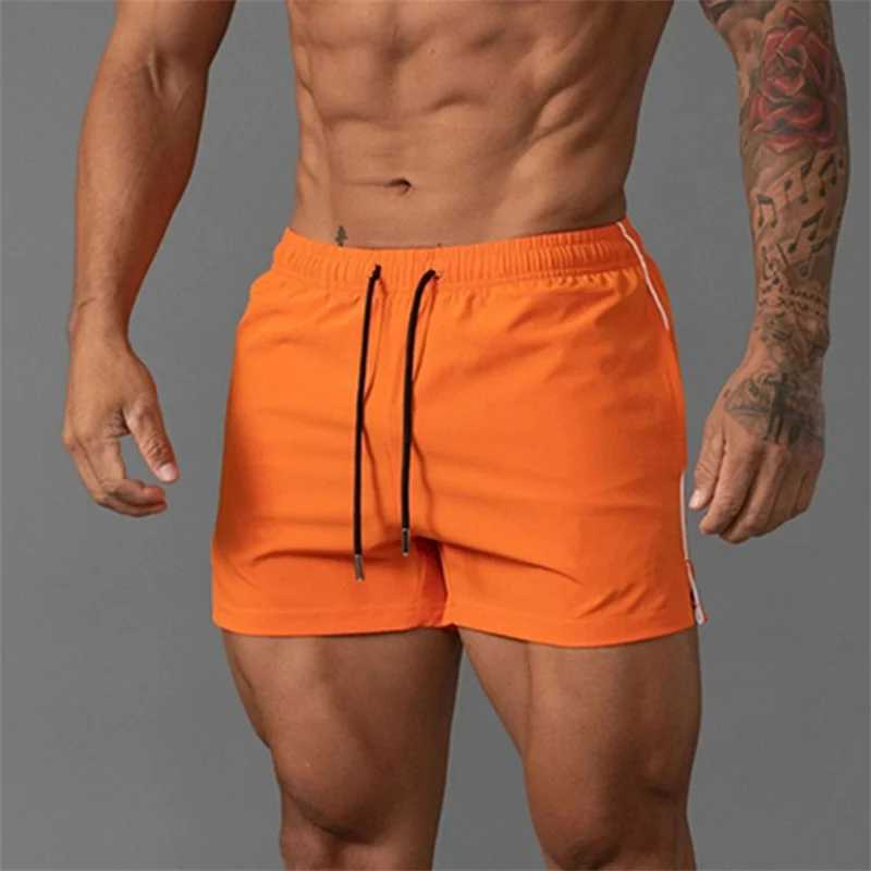 2024 New Summer Men Sports Outdoor Shorts Breathable Leisure Fitness short pants Men sweatpants Running Woven loose beach shorts W250219
