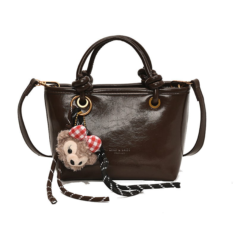 Melad oil wax leather bucket 2025 super hot handbag, shoulder crossbody bag, versatile #swissmilitary