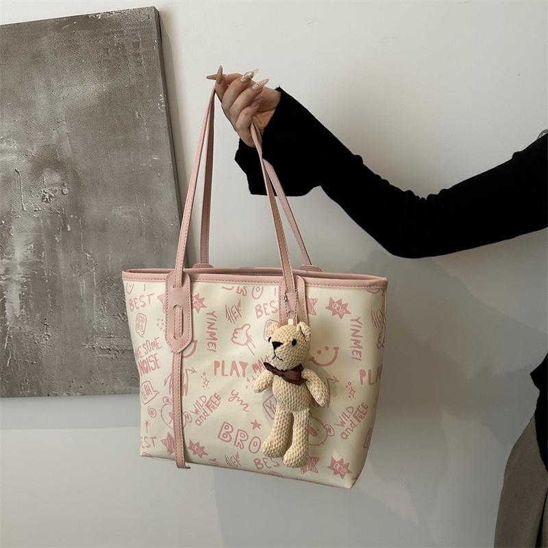 Tote women's large capacity shoulder high-end sense, big bag, 2025 new trendy and niche graffiti class commuting bag #swissmilitary