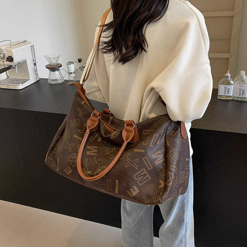 Large capacity tote bag for women, new niche high-end handbag, practical, fashionable, versatile single shoulder crossbody bag 250115