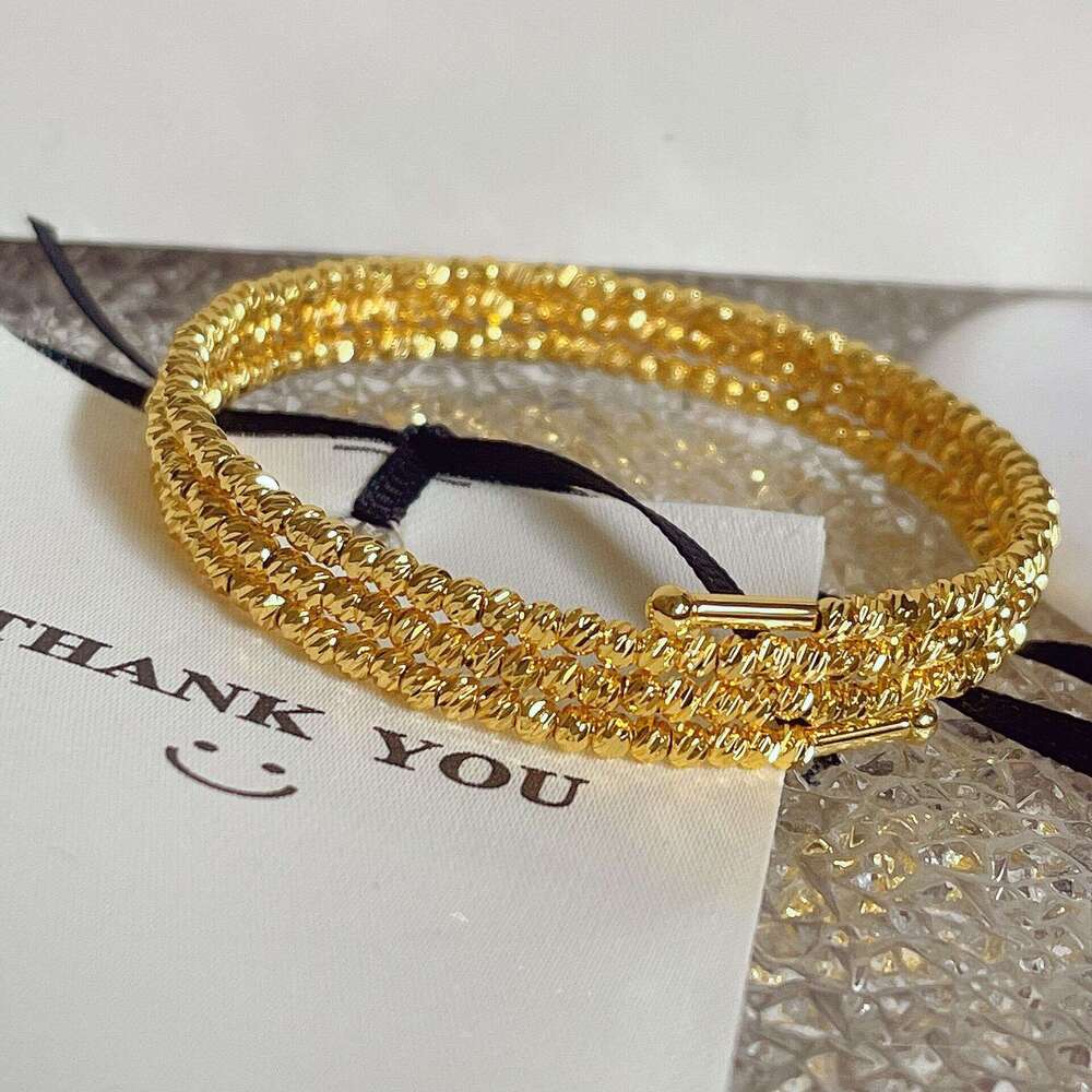 French metallic high-end gold bouncing ball three circle with a feminine temperament, light , fashionable and versatile foreign style bracelet