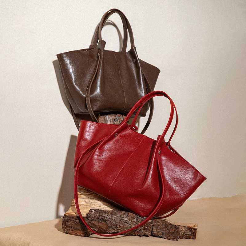 Luxury Tan Cowhide Wing Shoder BagDesigner Large Capacity Genuine Leather Wens Armpit Tote Bag Cmuting Handbag Z250514