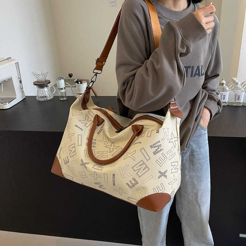 Large capacity tote bag for women, new niche high-end handbag, practical, fashionable, versatile single shoulder crossbody bag 250115