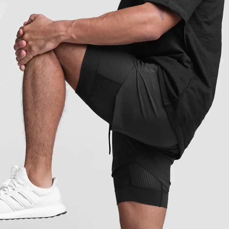 New breathable double-layer sports shorts for 2024 gym fitness fast drying beach exercise mens running shorts for short periods of time W250219