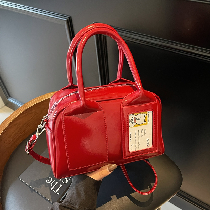 Bright Korean solid color hand-held Boston 2025 early spring new item, niche and interesting design, single shoulder crossbody bag #swissmilitary