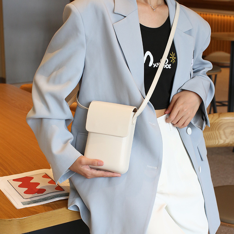 Korean version solid color pressed shell phone 2025 fashionable and versatile vertical small square simple commuting single shoulder diagonal swissmil
