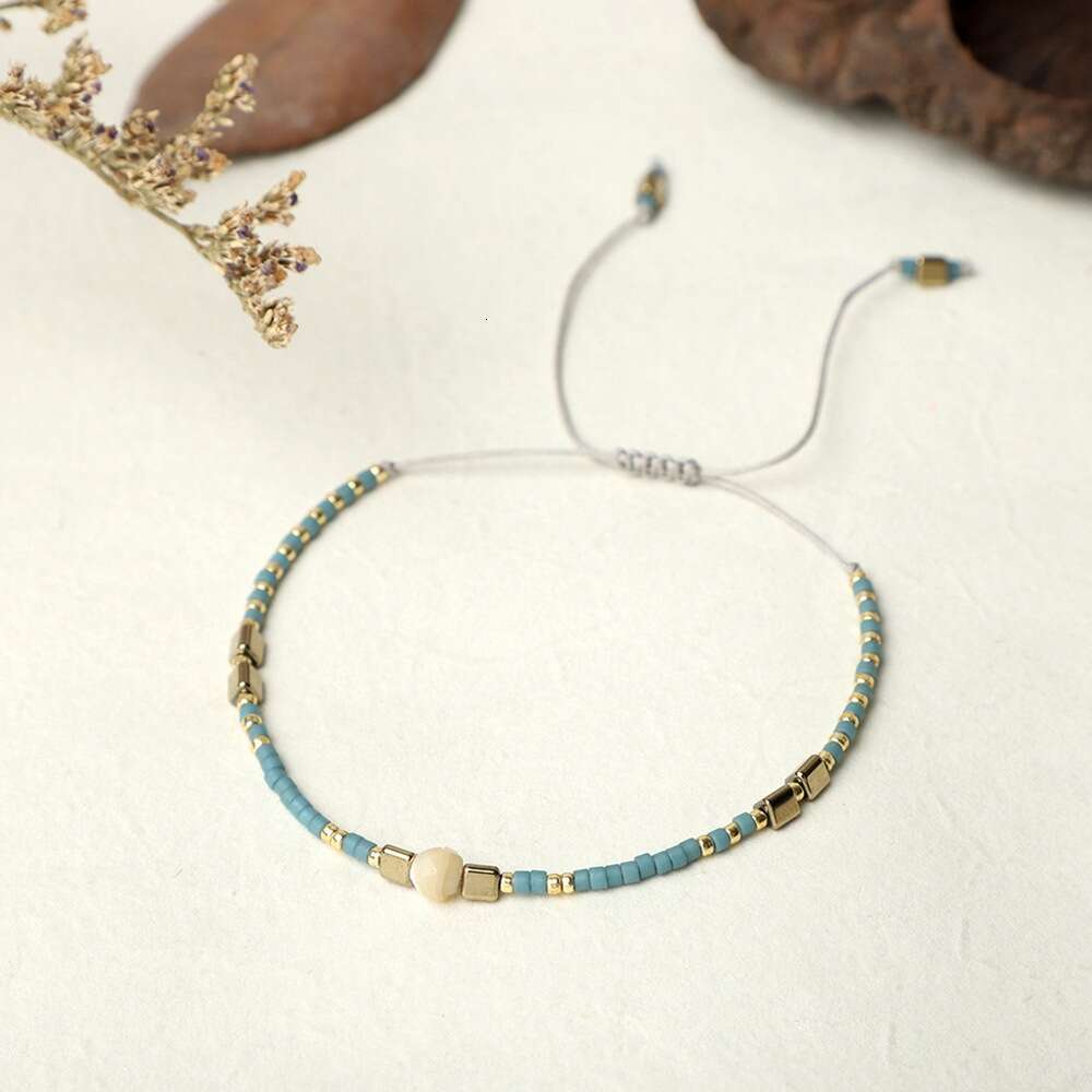 Bohemian style minimalist rice bead hand woven friendship rope iron gallbladder half women's jewelry small bracelet