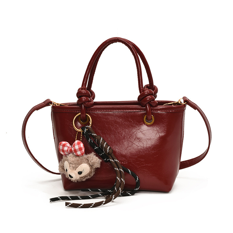 Melad oil wax leather bucket 2025 super hot handbag, shoulder crossbody bag, versatile #swissmilitary