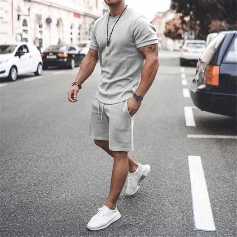 Solid color European and American mens 13 color summer new short sleeved T-shirt+short sleeved 2-piece casual sports mens setXJ250326