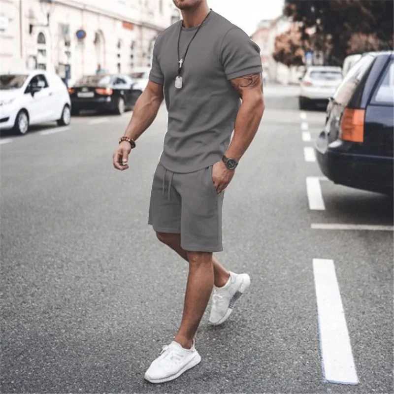 Solid color European and American mens 13 color summer new short sleeved T-shirt+short sleeved 2-piece casual sports mens setXJ250326