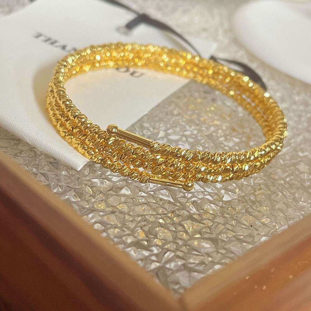 French metallic high-end gold bouncing ball three circle with a feminine temperament, light , fashionable and versatile foreign style bracelet