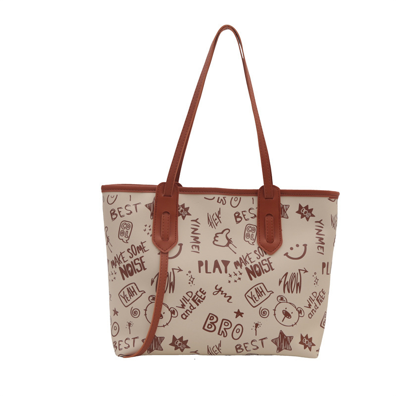 Tote women's large capacity shoulder high-end sense, big bag, 2025 new trendy and niche graffiti class commuting bag #swissmilitary