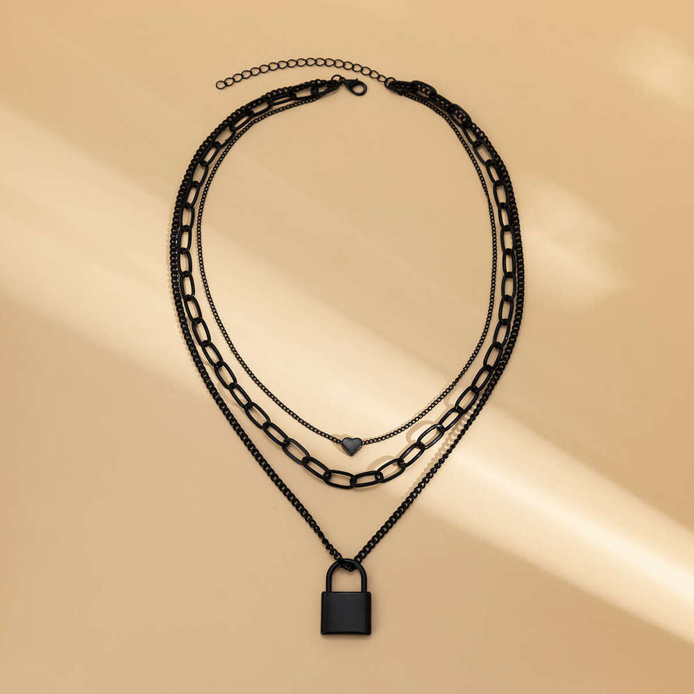 Dark punk style black cross chain layered with sweet and cool geometric love lock necklace for women