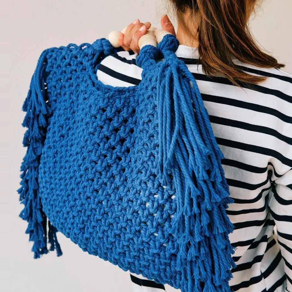 Womens handbag large capacity luxury designer womens handbag 2024 knitted tassel bead decorative wallet womens beach bag Z250219