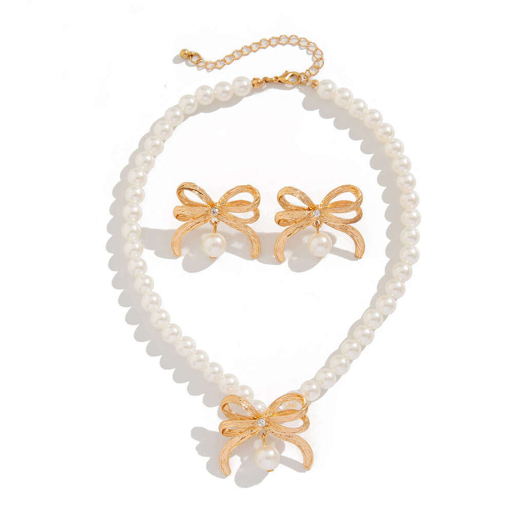 Jewelry fashion imitation pearl bead necklace set, light style alloy bow collarbone chain