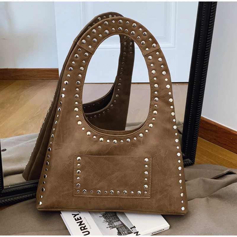 Retro decorative shoulder bag European and American motorcycle style nail wallet leather armrest bag hot womens handbag Y250218